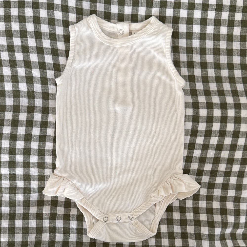 Kate Quinn Sleeveless Ruffle Leg Bodysuit in Coconut Organic Cotton Skinny Rib
